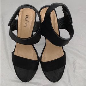 New (worn once) Black adjustable Velcro heels.